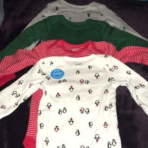 Carter’s Set of 4 long sleeved onesies